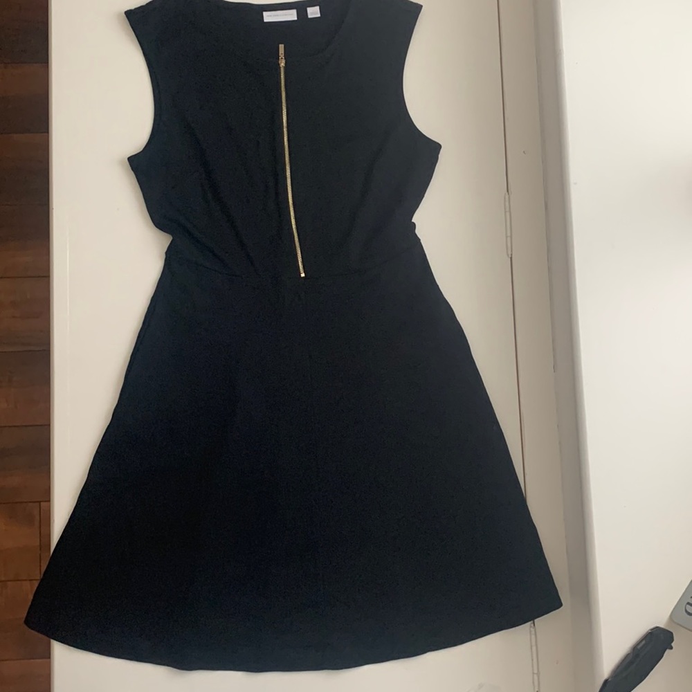 Black dress with gold zipper in front